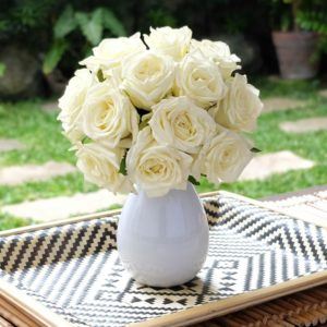 White Noami roses bouquet in vase