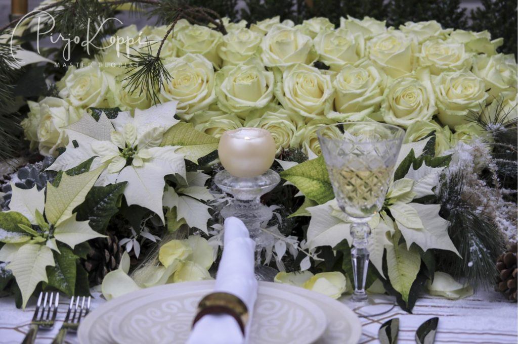 festive season table by pirjo koppi with white naomi porta nova roses